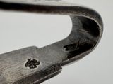 a close up of a pair of scissors on a table