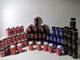 many different colors of paint on the table