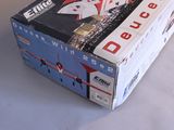 a box with a picture of a man playing cards on it