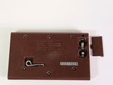 a brown electronic device that is sitting on a table