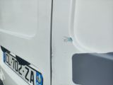 a white van parked on the side of the road