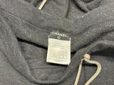 a label on the back of a chanel hoodie