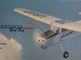 a box with a picture of a small plane in the sky