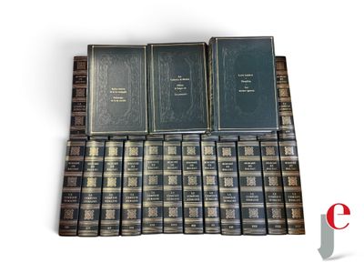 a bunch of books sitting on top of each other on a table
