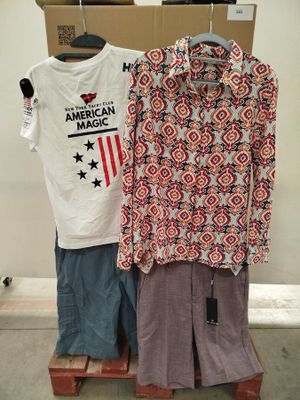 two shirts that are on a rack in front of a box