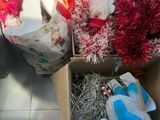 a box full of stuffed animals sitting on the floor