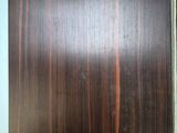 a close up of a piece of wood on a table