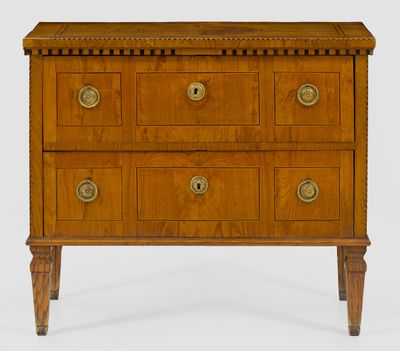 a wooden chest of drawers with brass pulls and drawers