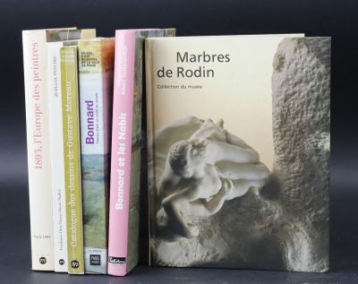 three books that are sitting next to each other on a table
