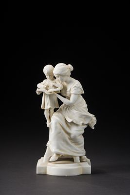 an image of a statue of a woman holding a child