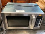 a microwave that is sitting on top of a counter