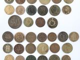 an image of a pile of old coins sitting on top of a white surface