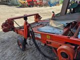 une image représentant un tracteur avec une remorque attelée à l'arrière