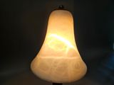 a lamp that is sitting on a table in the dark