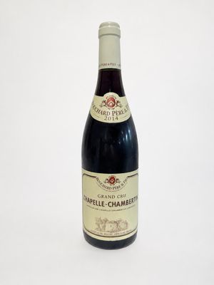 a bottle of wine that is sitting on a table