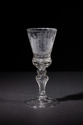 a glass that is sitting on a table