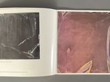 an open book with a picture of a man and a woman on it
