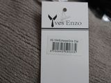 a label that says yes enzo on the back of a jacket