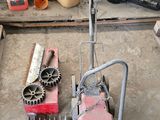 a machine that is sitting on the floor in the garage
