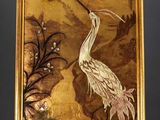 an image of a painting of a crane and flowers in a gold frame