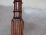 an image of a close up of a table with a wooden base