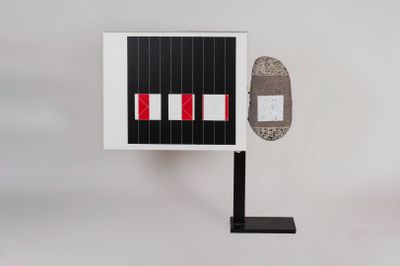 a picture of a skateboard on a stand with a picture on it