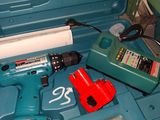 a blue tool in the back of a blue case