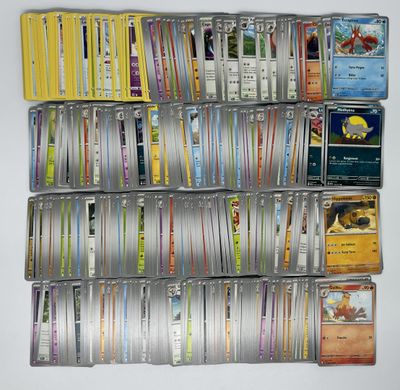 a lot of different types of card games on the table