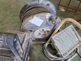 a pile of old electrical equipment sitting on the floor