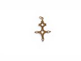 a small gold cross pendant with a cross on it