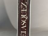 an image of a box of chocolate covered chocolates sitting on a table