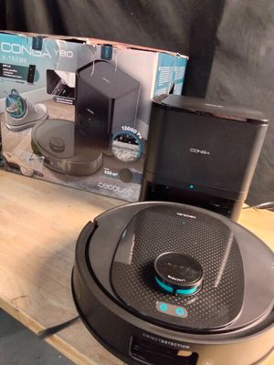 a box of electronics on a table next to a laptop