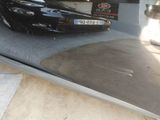 a reflection of a car in the mirror of a car