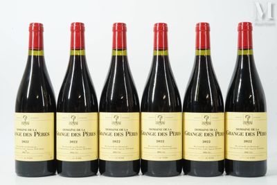 six bottles of red wine are lined up in a row