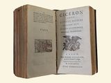 an open book with a picture of a dragon on it