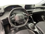 a steering wheel and dashboard of a small car