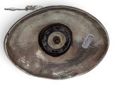 a metal object with a tag on it