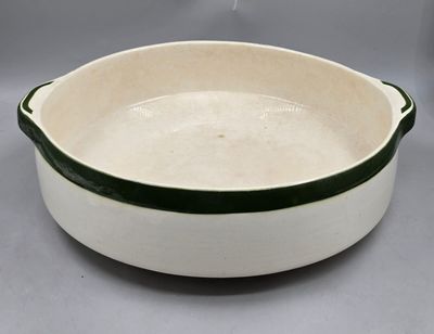 53 / SS Eta / Importante cuvette en faïence à bordure …