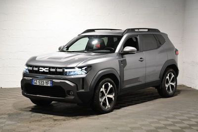 the grey suv is parked in a large room with a checkered floor