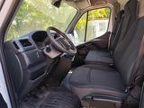 a view of the inside of a van with the driver ' s seat up