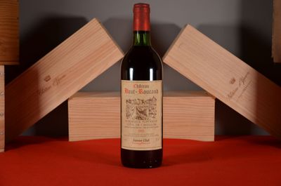 a bottle of wine that is sitting on a table