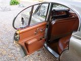 a car that has a door open on the side of the road