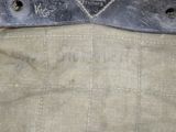 a close up of a piece of cloth with holes in it
