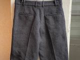 a close up of a pair of shorts hanging on a wall