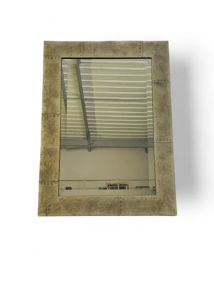 a square mirror with a window in the middle of it