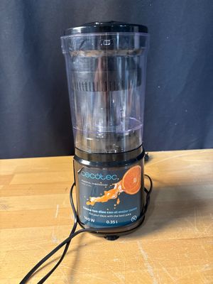 a blender that is sitting on a wooden table
