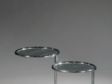 paire de tables d'appoint rondes avec plateau en verre