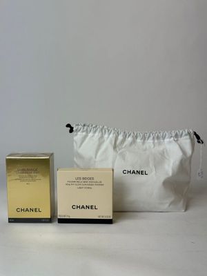chanel cosmetic bag with two boxes and a small pouch