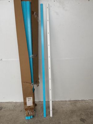 a picture of a room with a ladder and a box on the floor