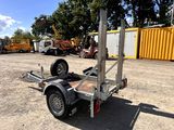 a trailer that is sitting in the dirt